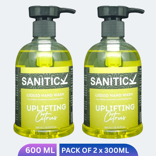 Orange liquid handwash bottles with citrus graphics